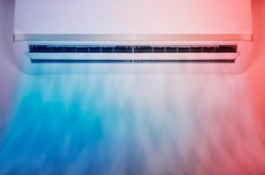 Air conditioner with blue and red color tint