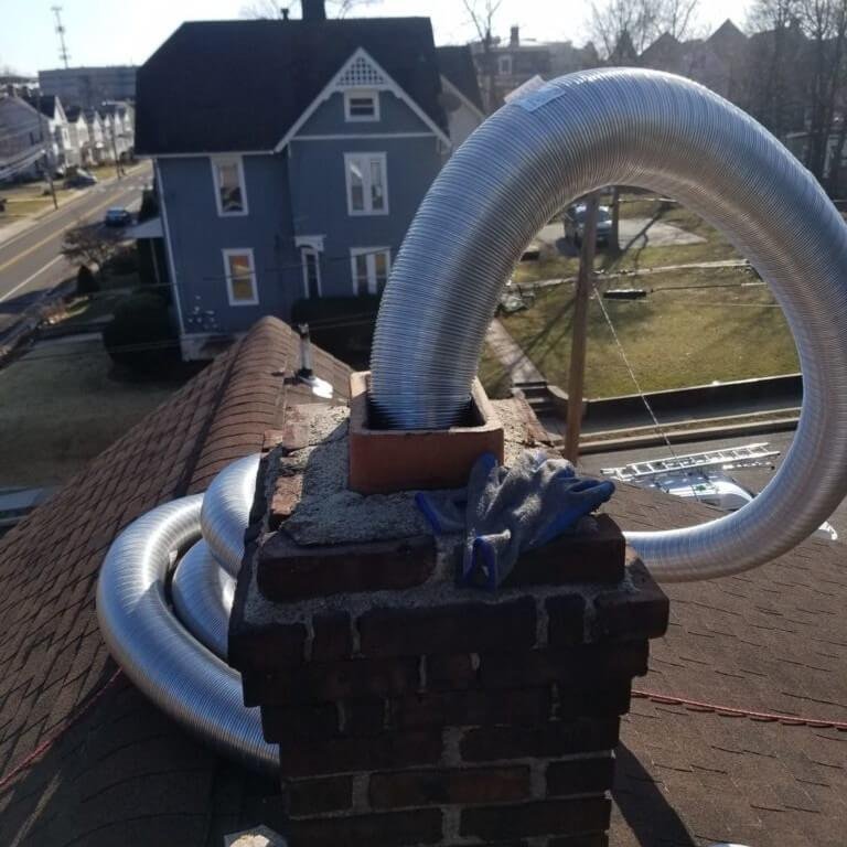 relining masonry chimney for a g ()